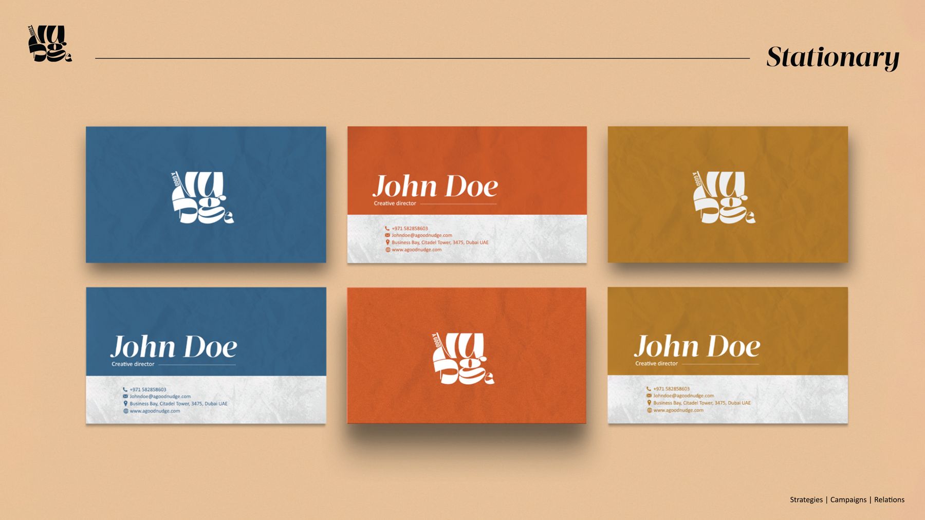 Nudge business cards in blue, mustard and rust colourways
